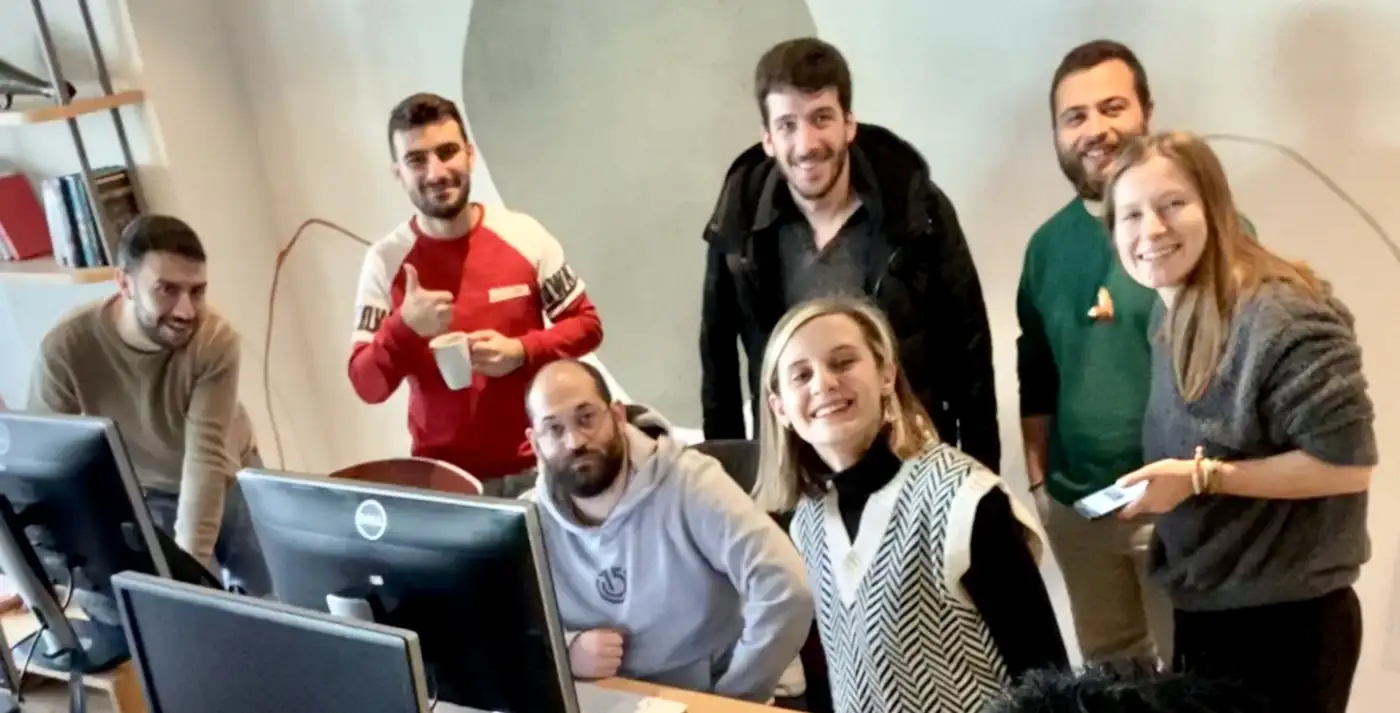 Seven Atolye15 developers and PMs in the İzmir office during a large-scale deployment.