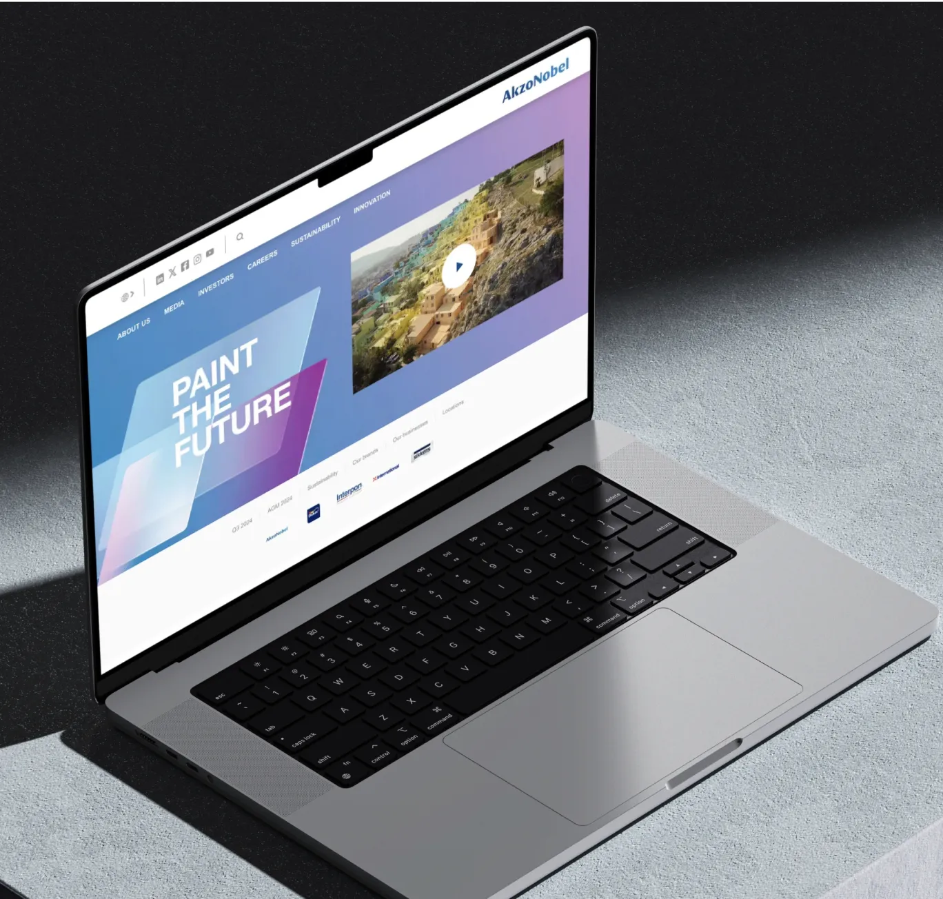 A product page featuring AkzoNobel’s ‘Paint the Future’ innovation challenge, displayed on a laptop screen with a clean, modern design.