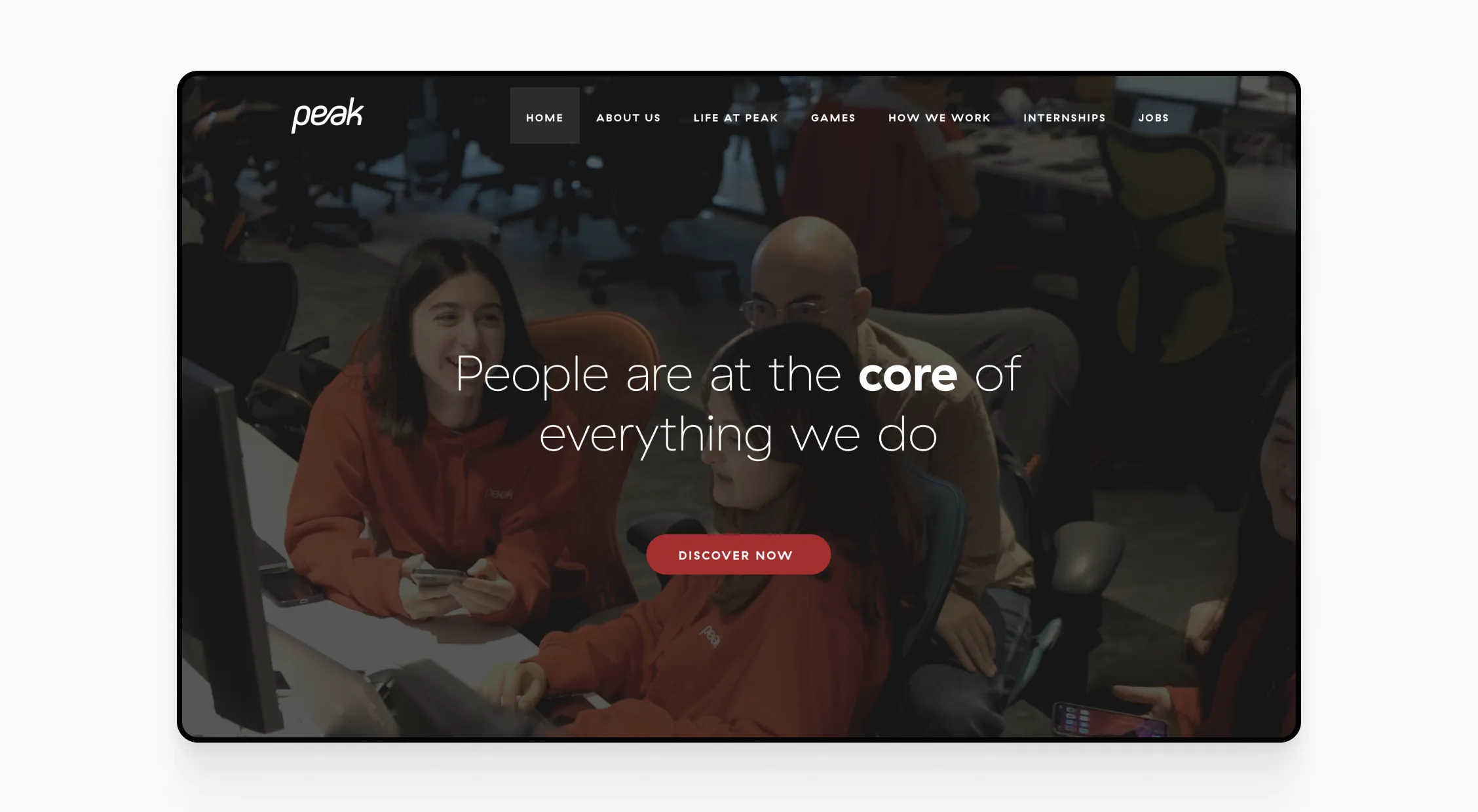Snapshot of Peak’s career page featuring employees working together in the office, emphasizing team collaboration and culture.